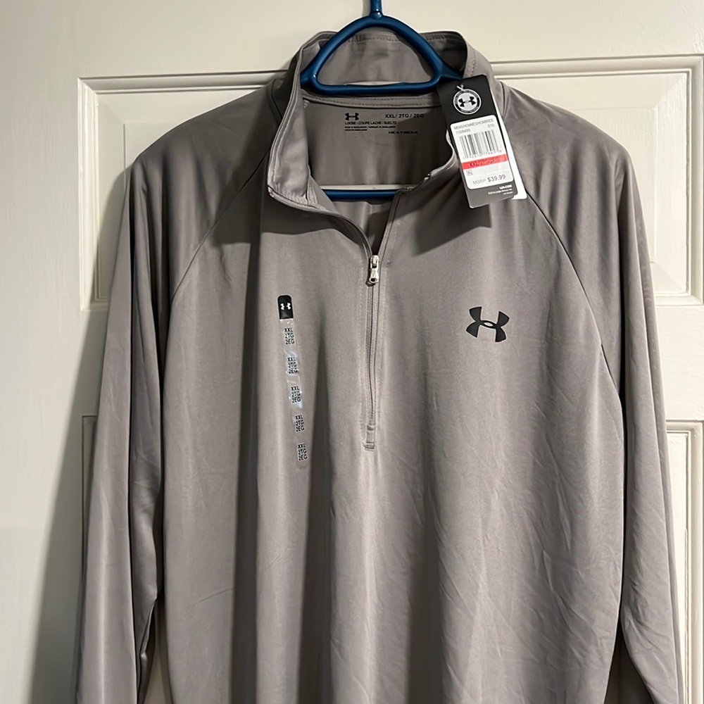 Men’s Under Armour 1/4 zip Heat Gear lightweight top. New with tags. Size XXL